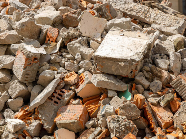 A,Pile,Of,Broken,Red,Bricks,And,Fragments,Of,Concrete